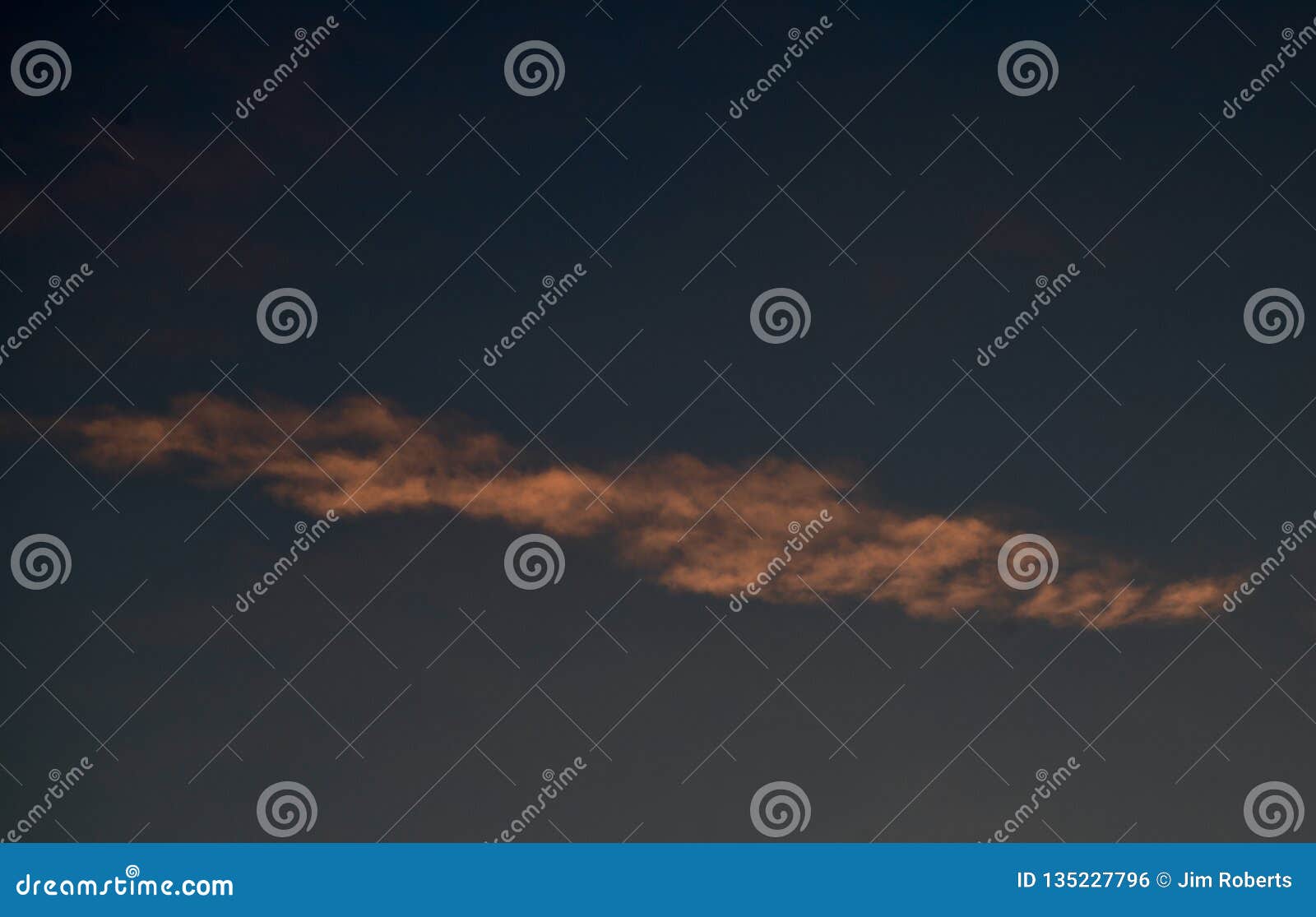 cirrus cloud illuminated by dawnÃ¢â¬â¢s early light